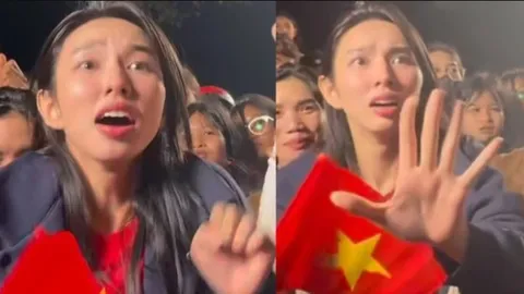 CLIP: Thùy Tiên rũ bỏ hình tượng Hoa hậu, hết mình cổ vũ tuyển Việt Nam